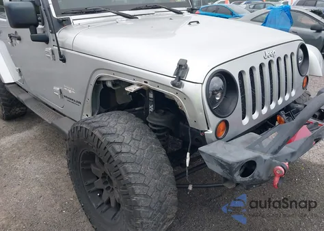 2007 Jeep Wrangler Unlimited Sahara from USA, damaged, VIN 1J4GA59127L211076